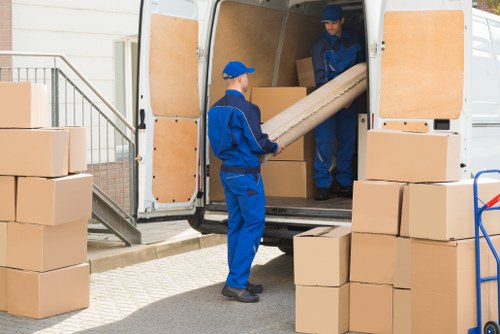 Student removals team loading boxes in Croydon