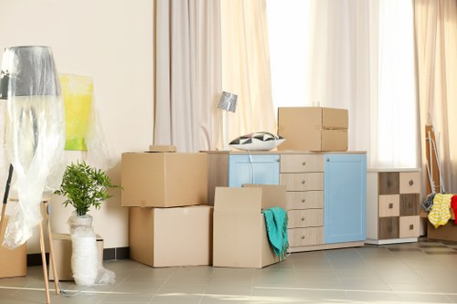 Prepared moving boxes and furniture ready for removal in Croydon