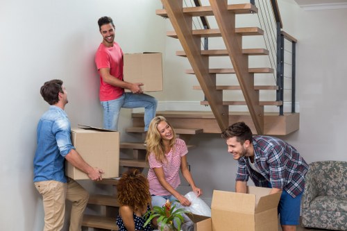 Local removals crew handling a Croydon property move with care