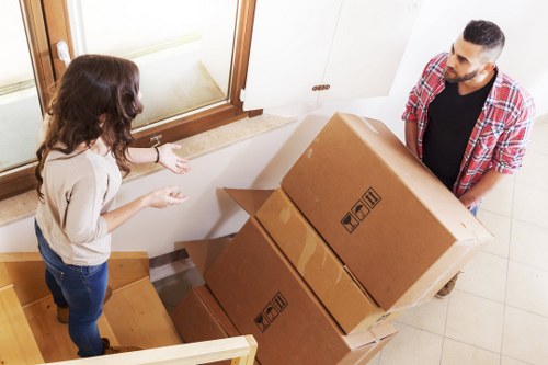 Moving items through a Croydon apartment building corridor
