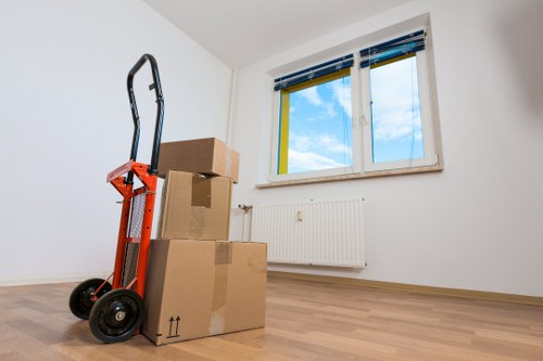 Professional movers handling furniture during a Croydon house move